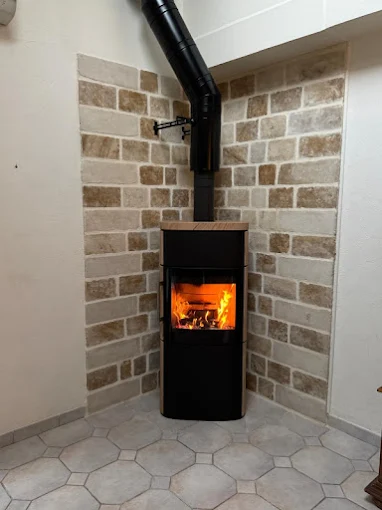 Installation d'un poêle à bois par Cheminées Renou à Villemandeur
